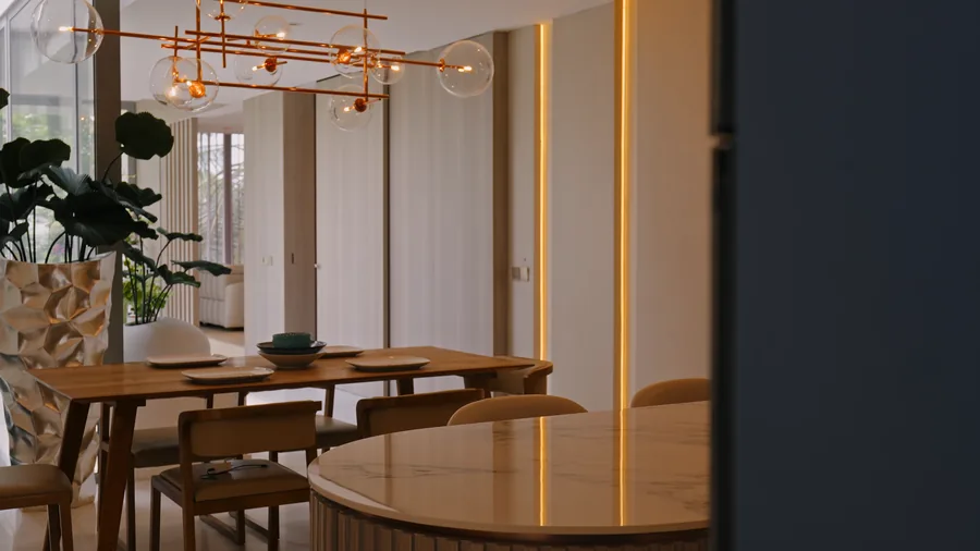 Dining room with pendant lighting and planting