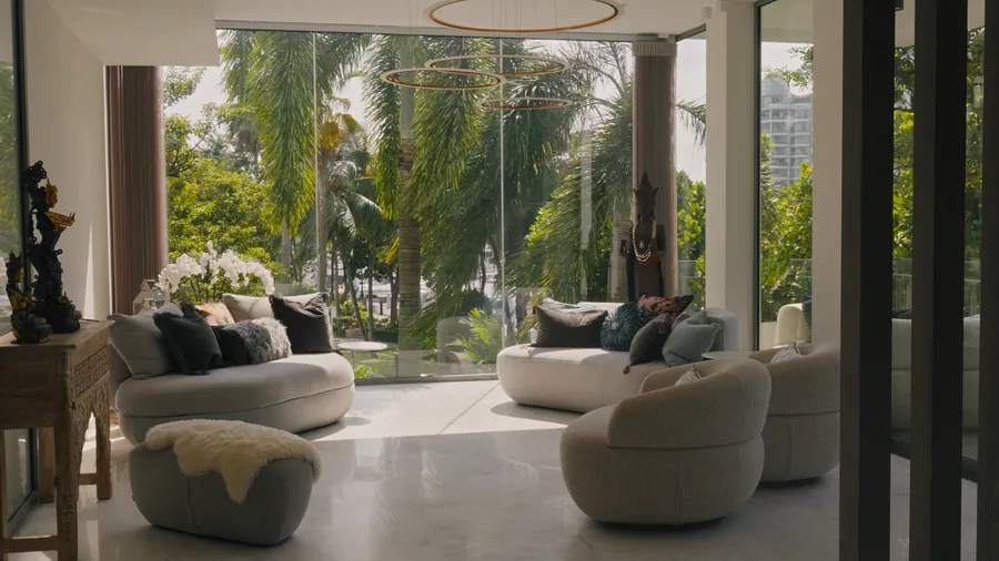 Living room framed by mature palms